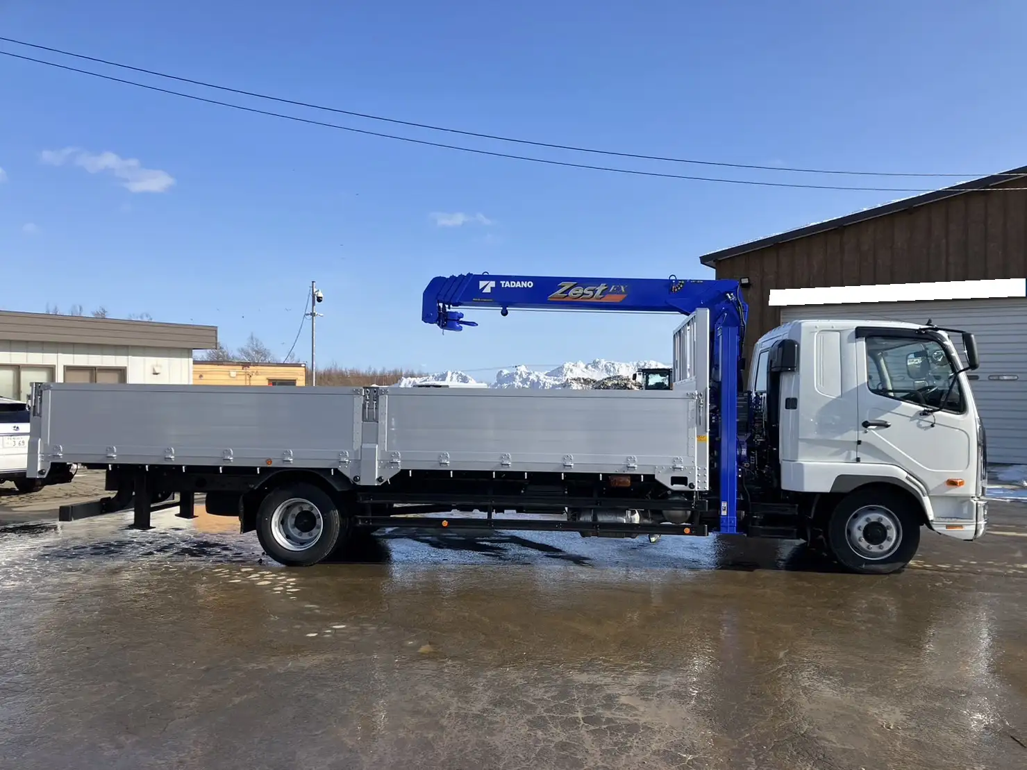 【荷台L6500‼】☆車検付き(R6.12.25)☆ 令和5年 三菱 増トンセルフクレーン タダノ4段 ラジコン 240馬力 MT リーフサス 積載:7,100㎏ 距離:1000㎞以下 の画像4